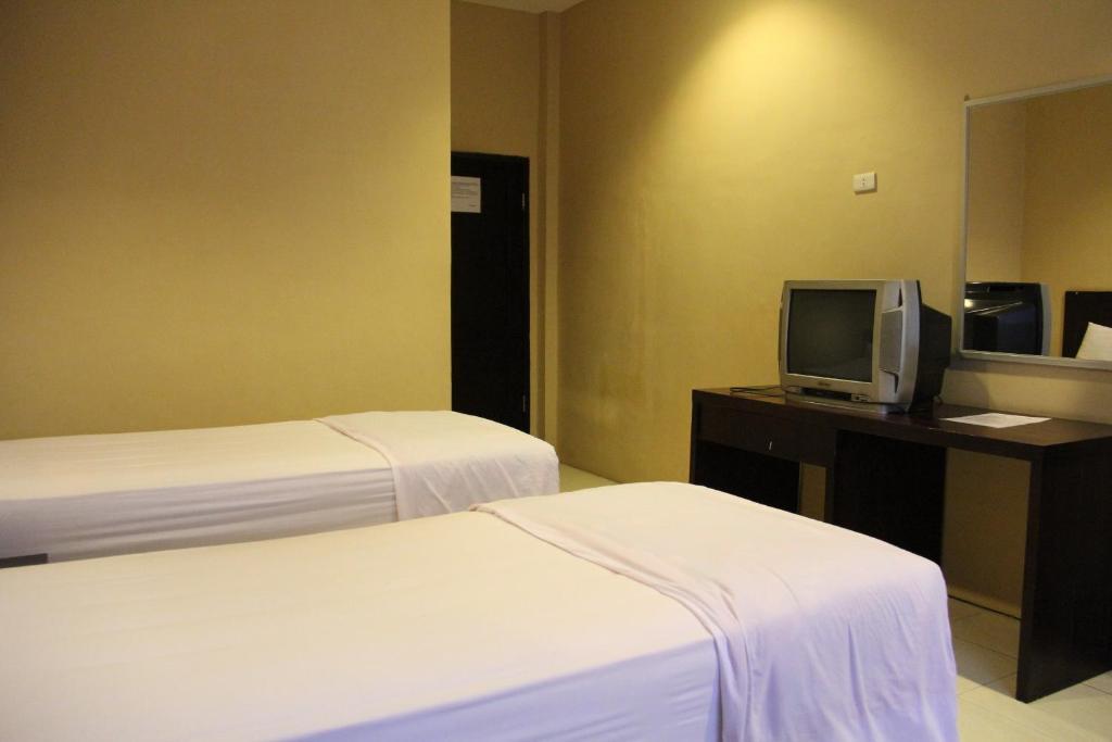 Hotel Sing A Song Пематангсиантар Номер фото