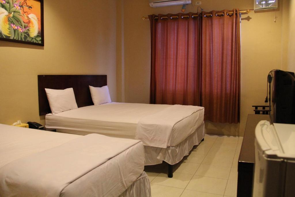Hotel Sing A Song Пематангсиантар Номер фото