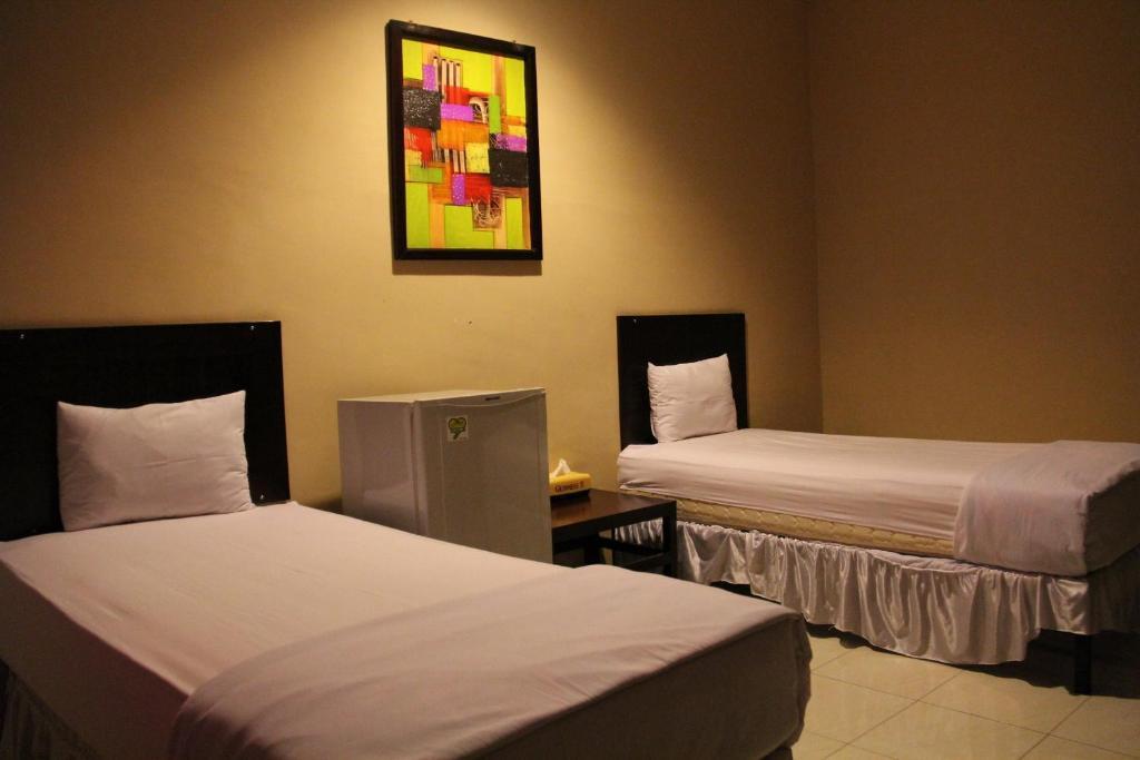 Hotel Sing A Song Пематангсиантар Номер фото