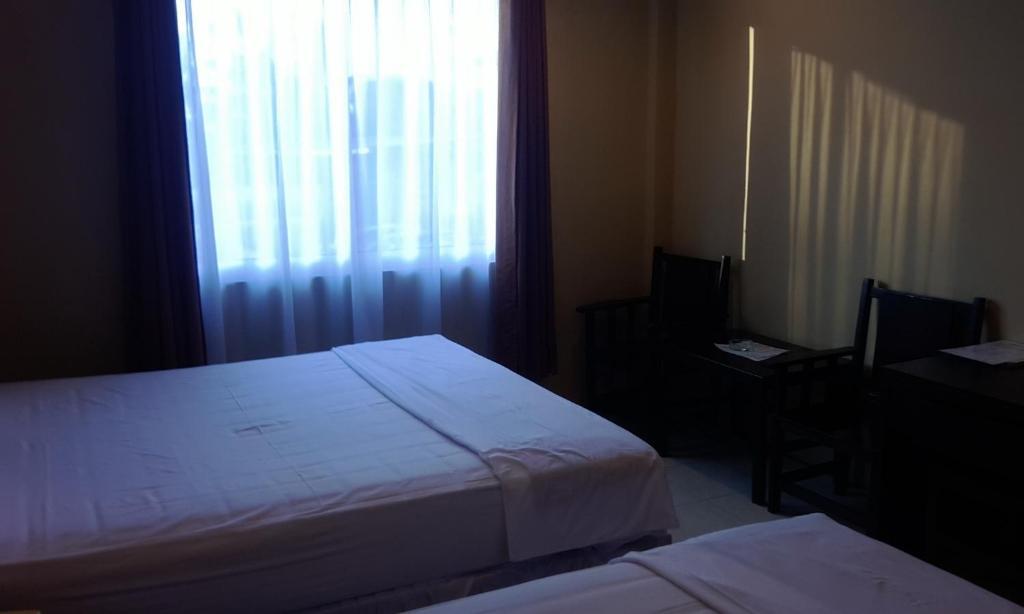 Hotel Sing A Song Пематангсиантар Номер фото