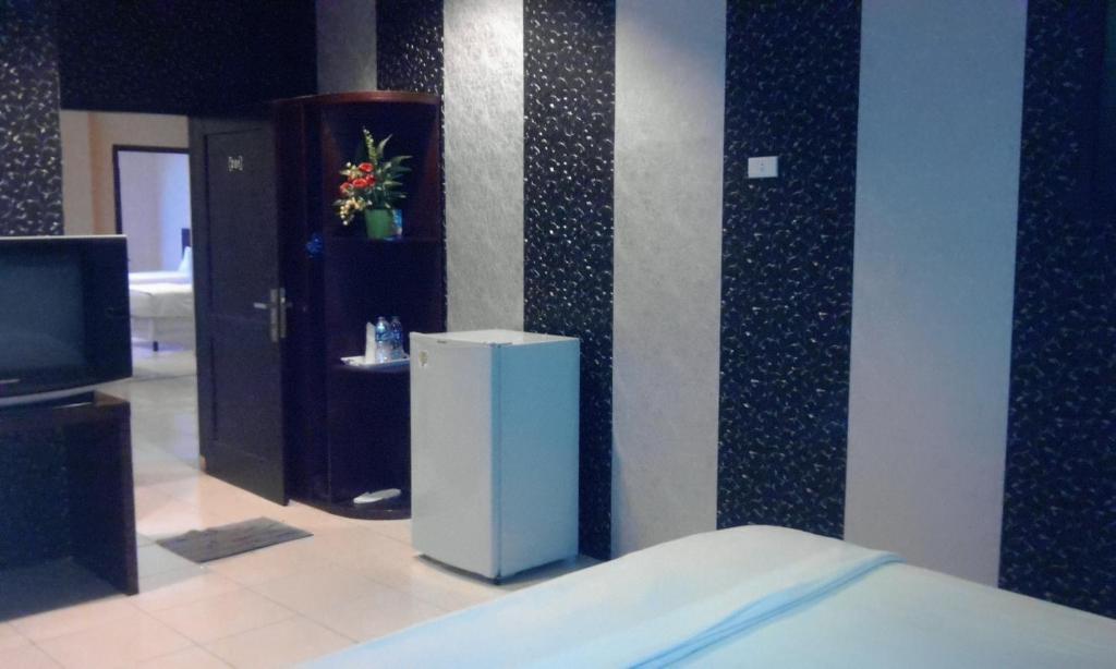 Hotel Sing A Song Пематангсиантар Номер фото